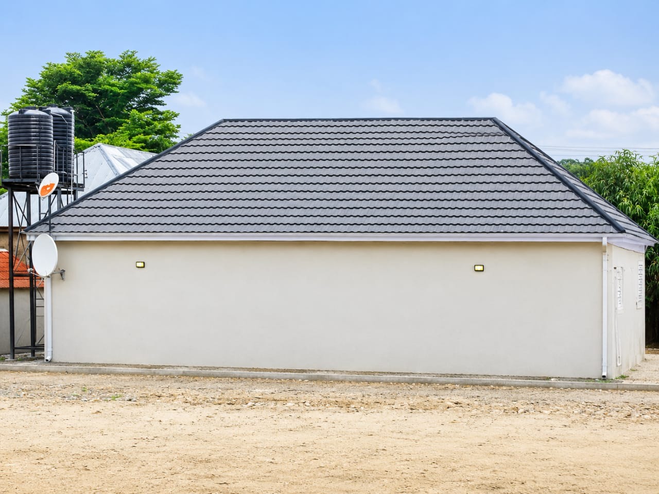 Bungalow with a completed hipped roof and clean fascia line