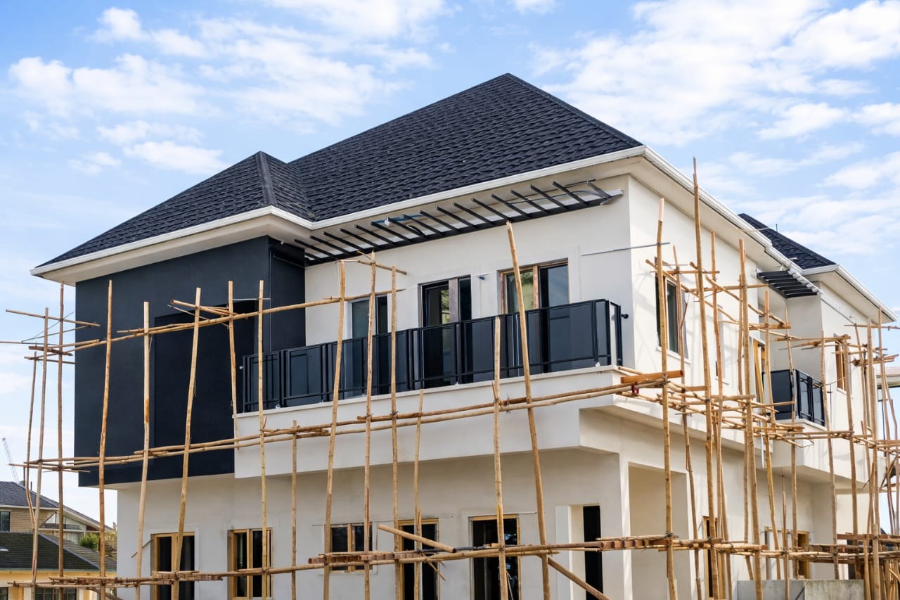 Modern duplex finished with a dark pitched roof